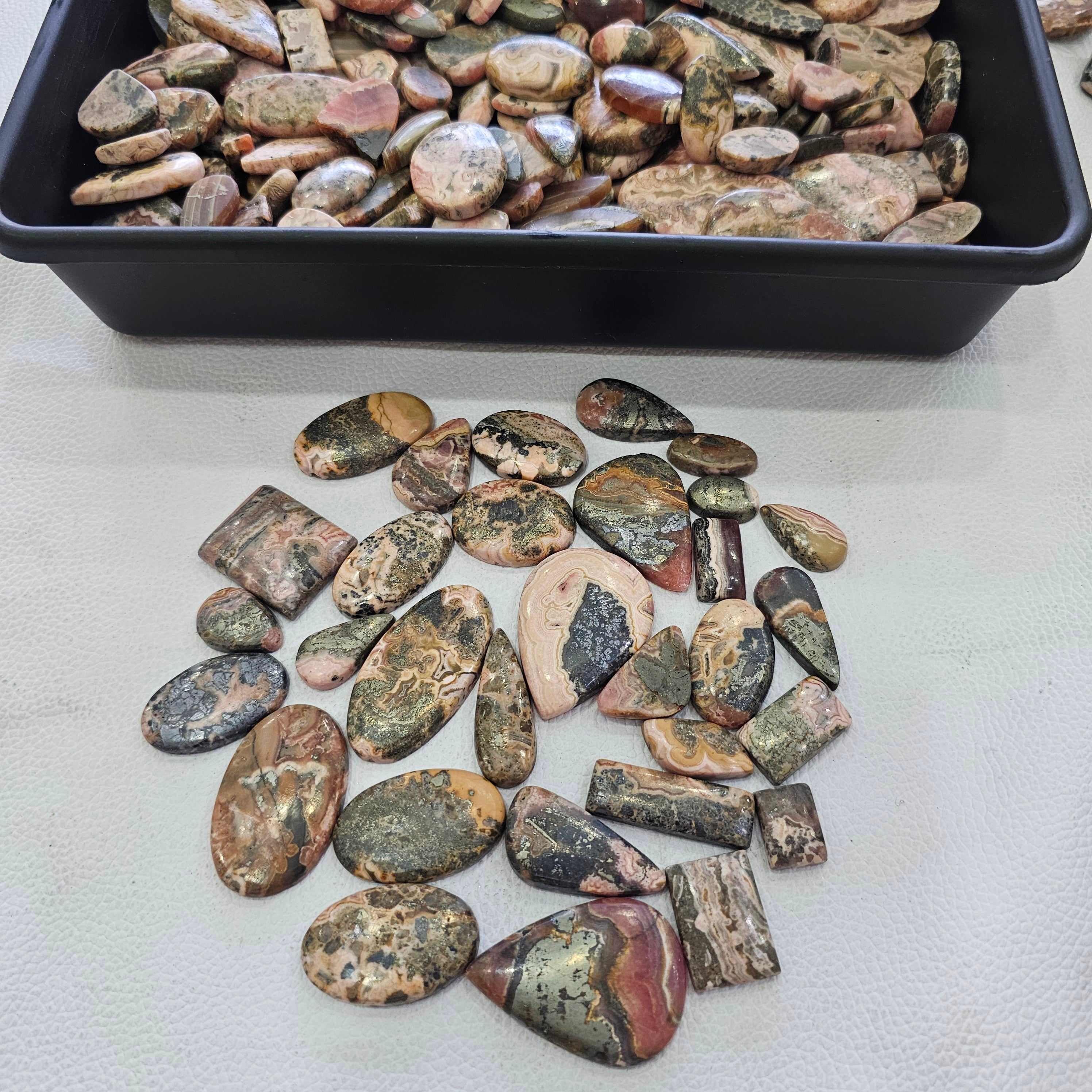 500 Grams of Natural Rhodocrosite with Pyrite Cabochons | 20ā40mm | 60ā80 Pcs - The LabradoriteKing