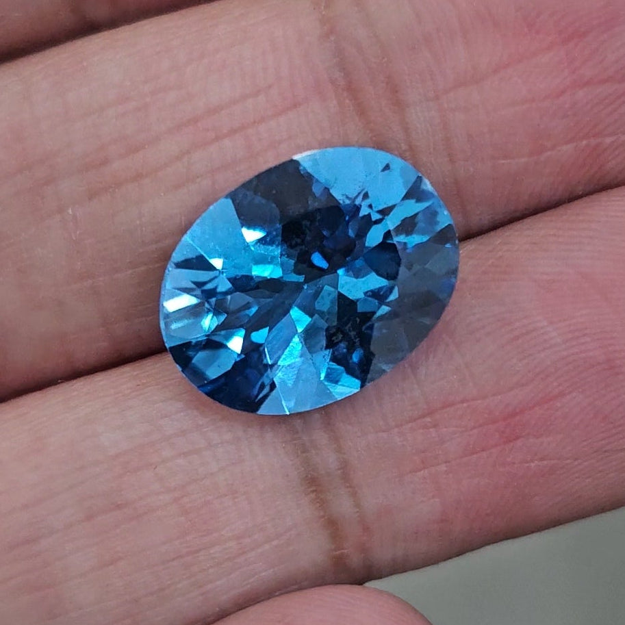 Natural Swiss Blue Topaz Faceted | Oval | 15x11mm - The LabradoriteKing