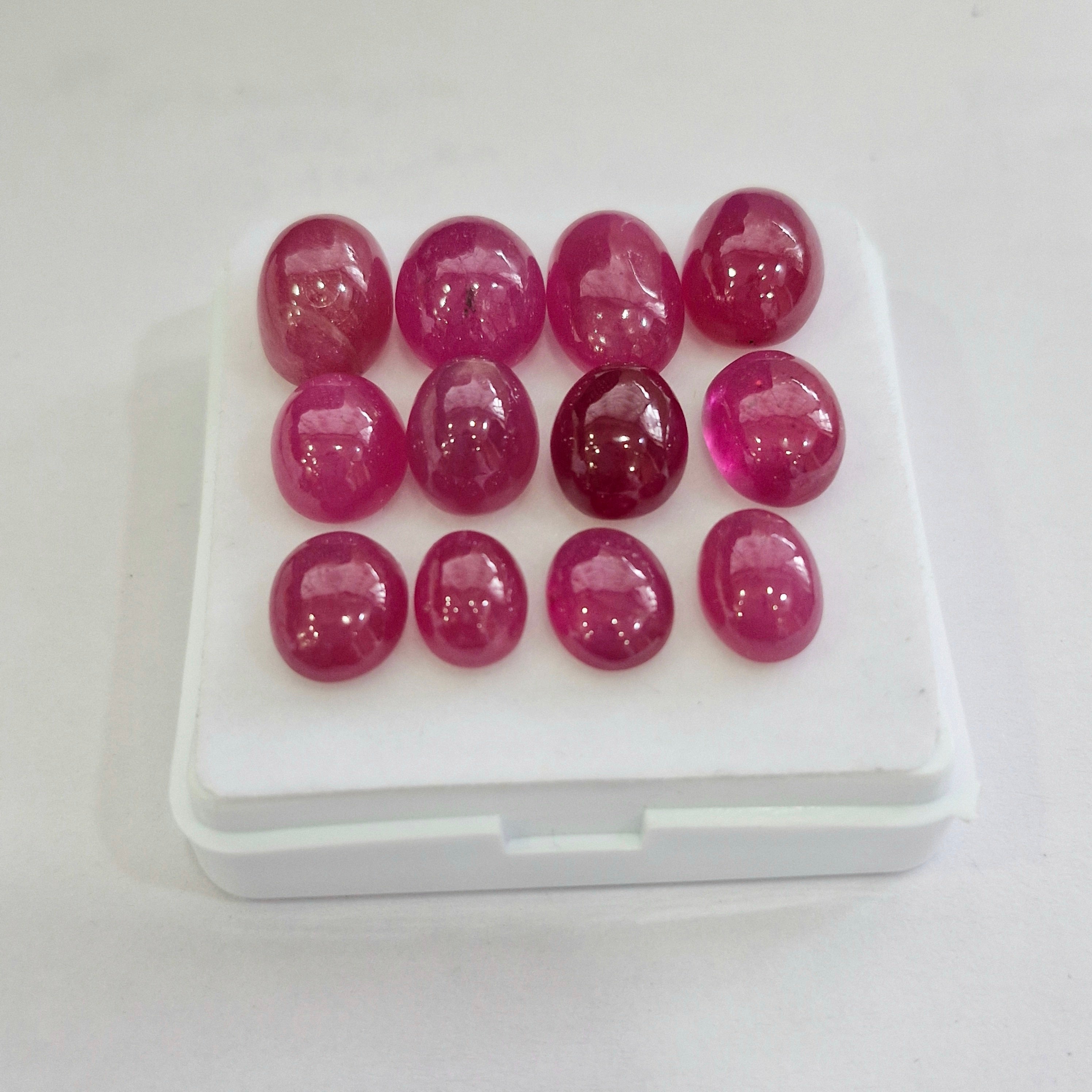 88.1cts Of Natural Clearance Ruby Cabochons | Oval | Size: 9-14mm | 12pcs