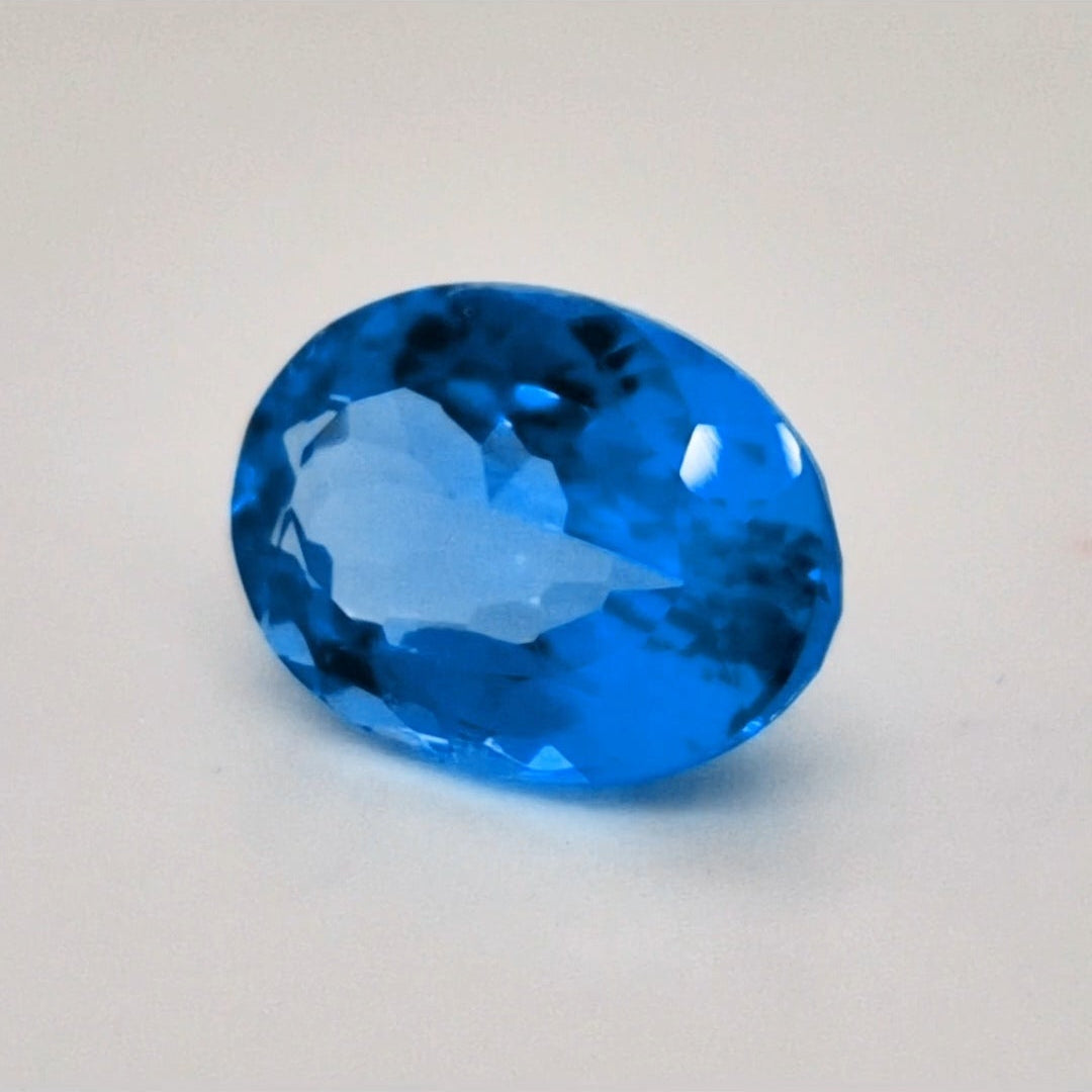 Natural Swiss Blue Topaz Faceted | Oval | 15x11mm - The LabradoriteKing