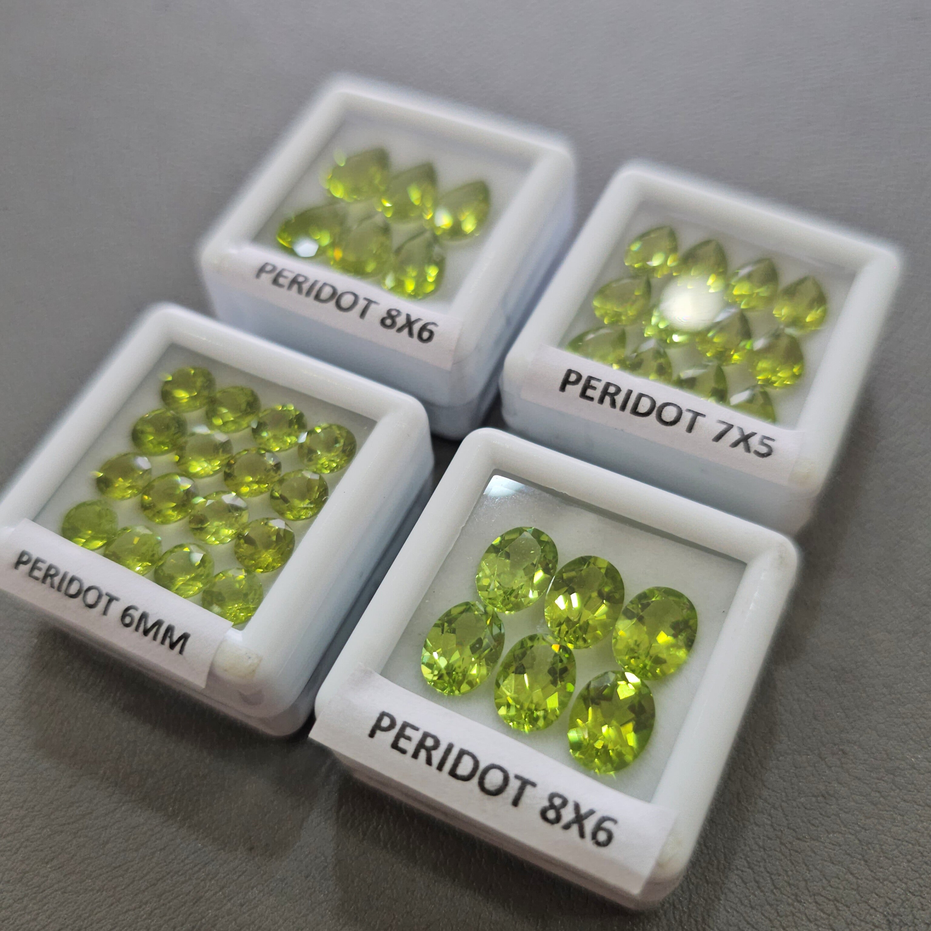 4 Boxes of Natural Peridot Faceted Gemstones | 6–8mm