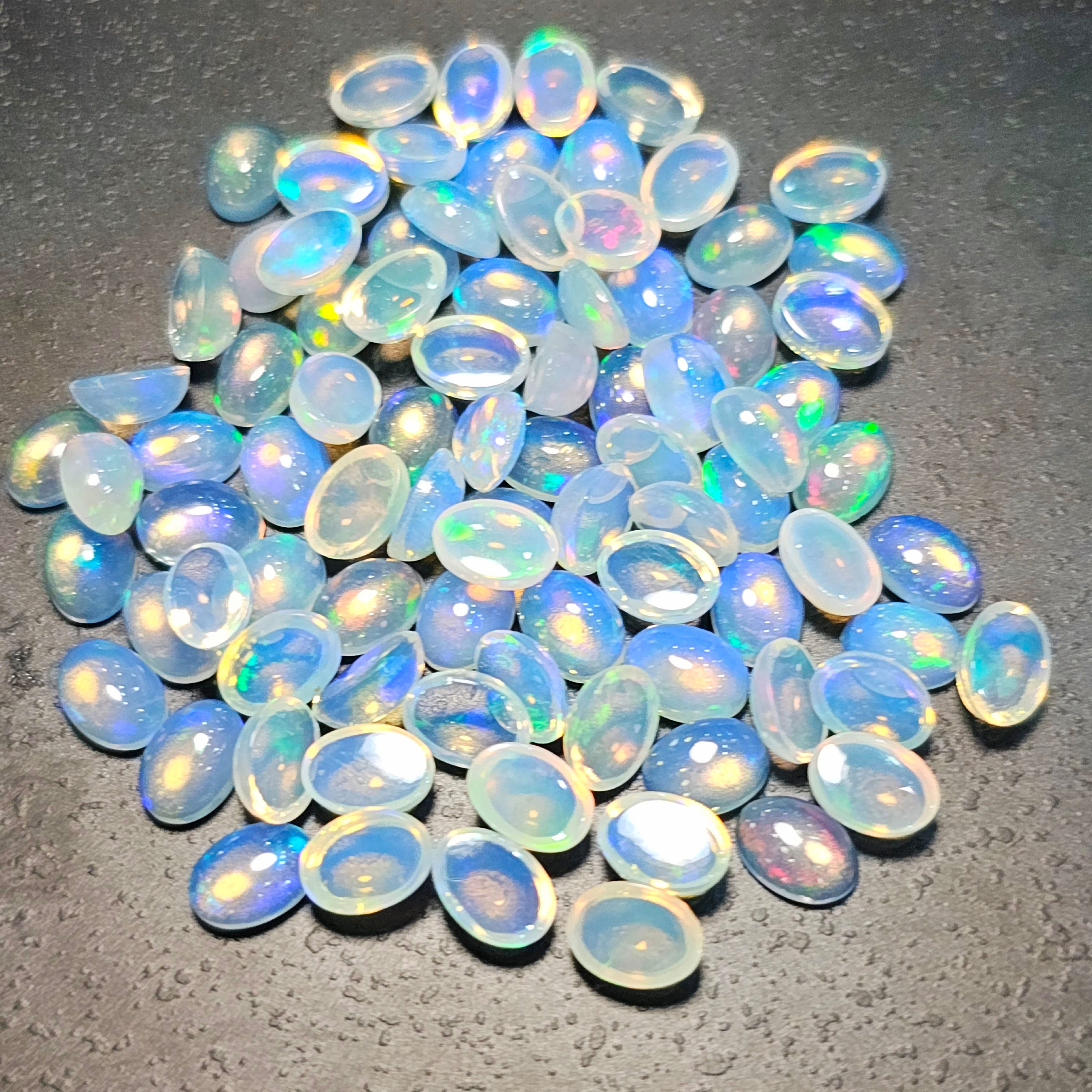 87 pcs Natural Ethiopian Opal Cabochon Gemstone Oval Shape:5-7mm - The LabradoriteKing