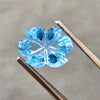 Load image into Gallery viewer, 10 Pcs Natural Blue Topaz Carved Flower Oval Shape 9mm - The LabradoriteKing