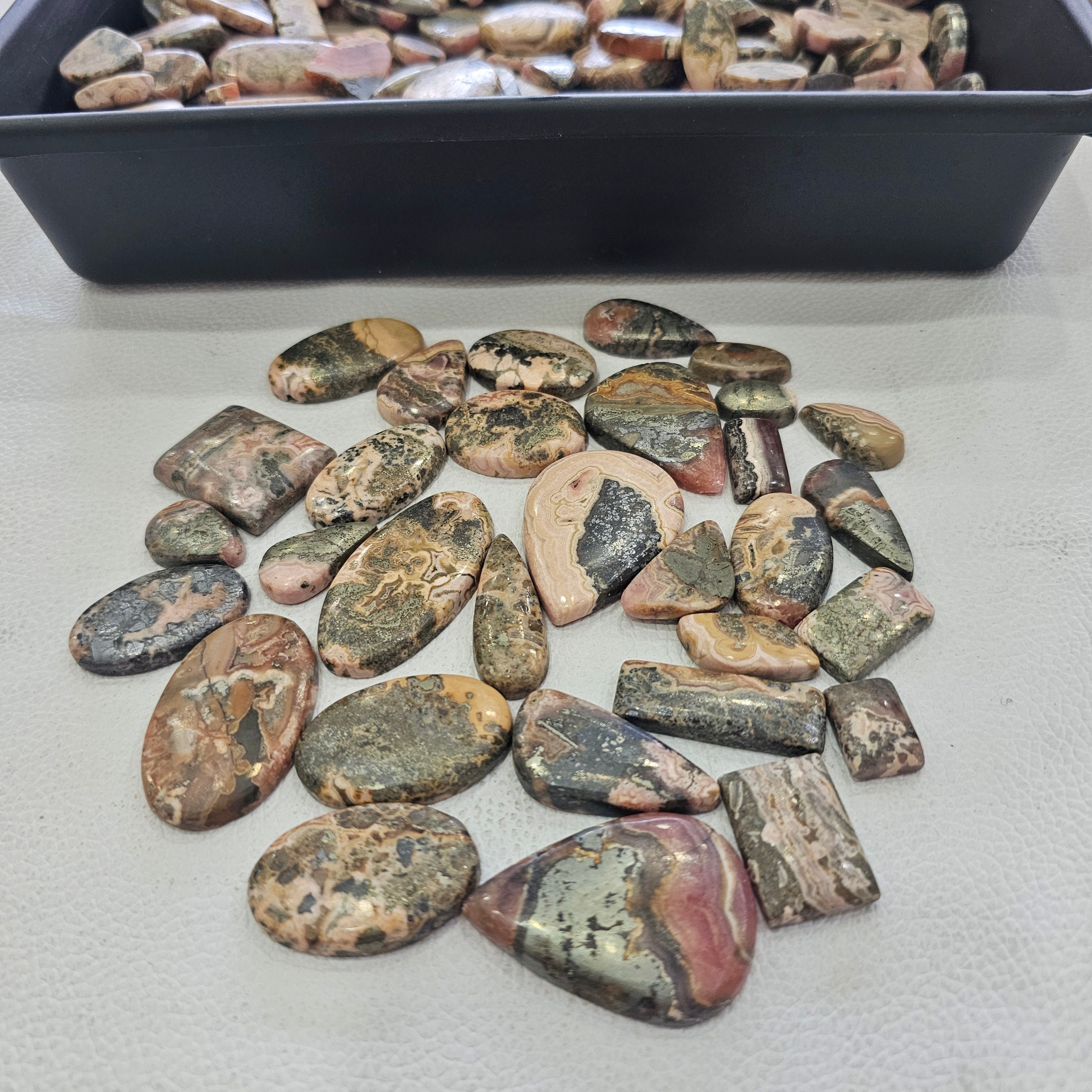 500 Grams of Natural Rhodocrosite with Pyrite Cabochons | 20–40mm | 60–80 Pcs
