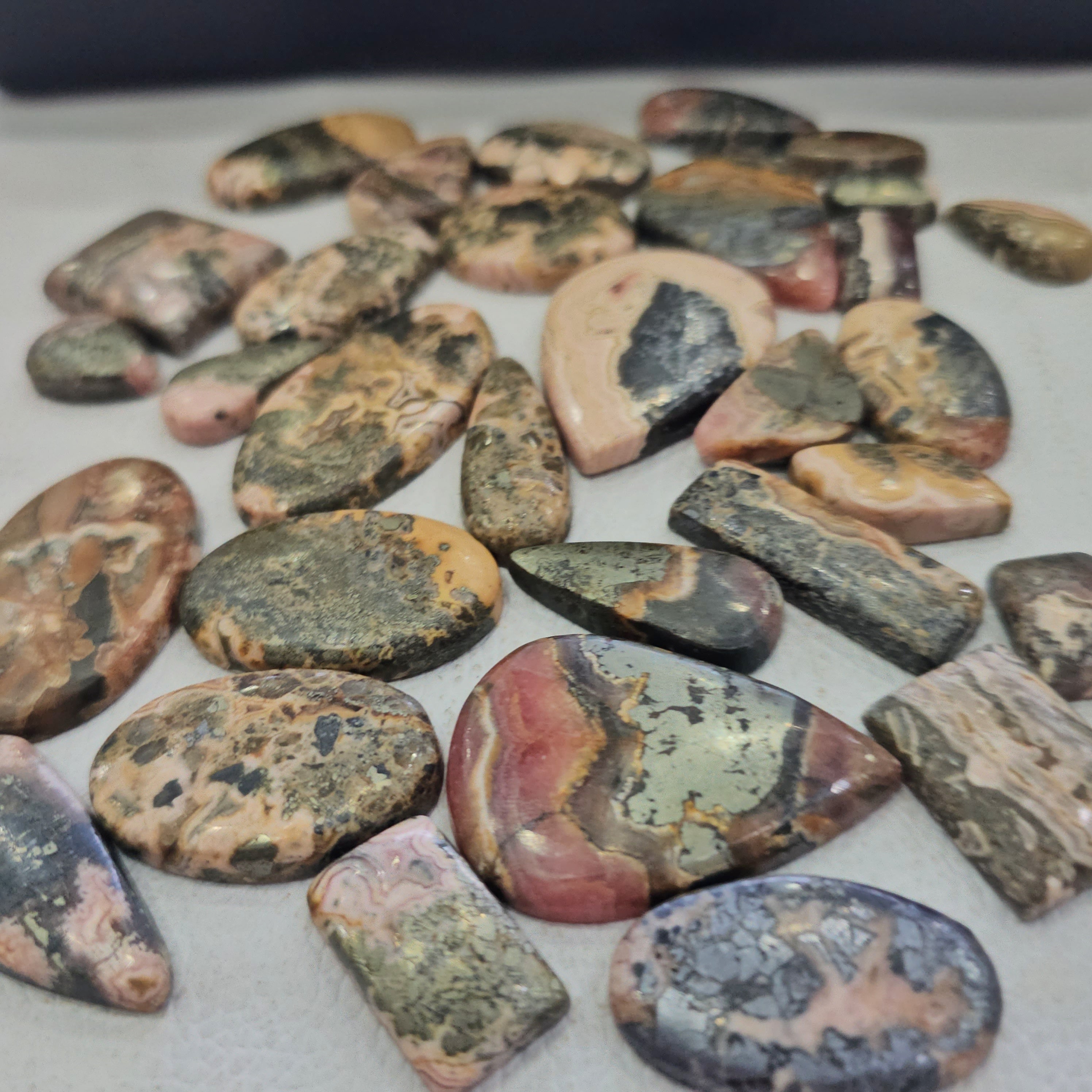 500 Grams of Natural Rhodocrosite with Pyrite Cabochons | 20–40mm | 60–80 Pcs