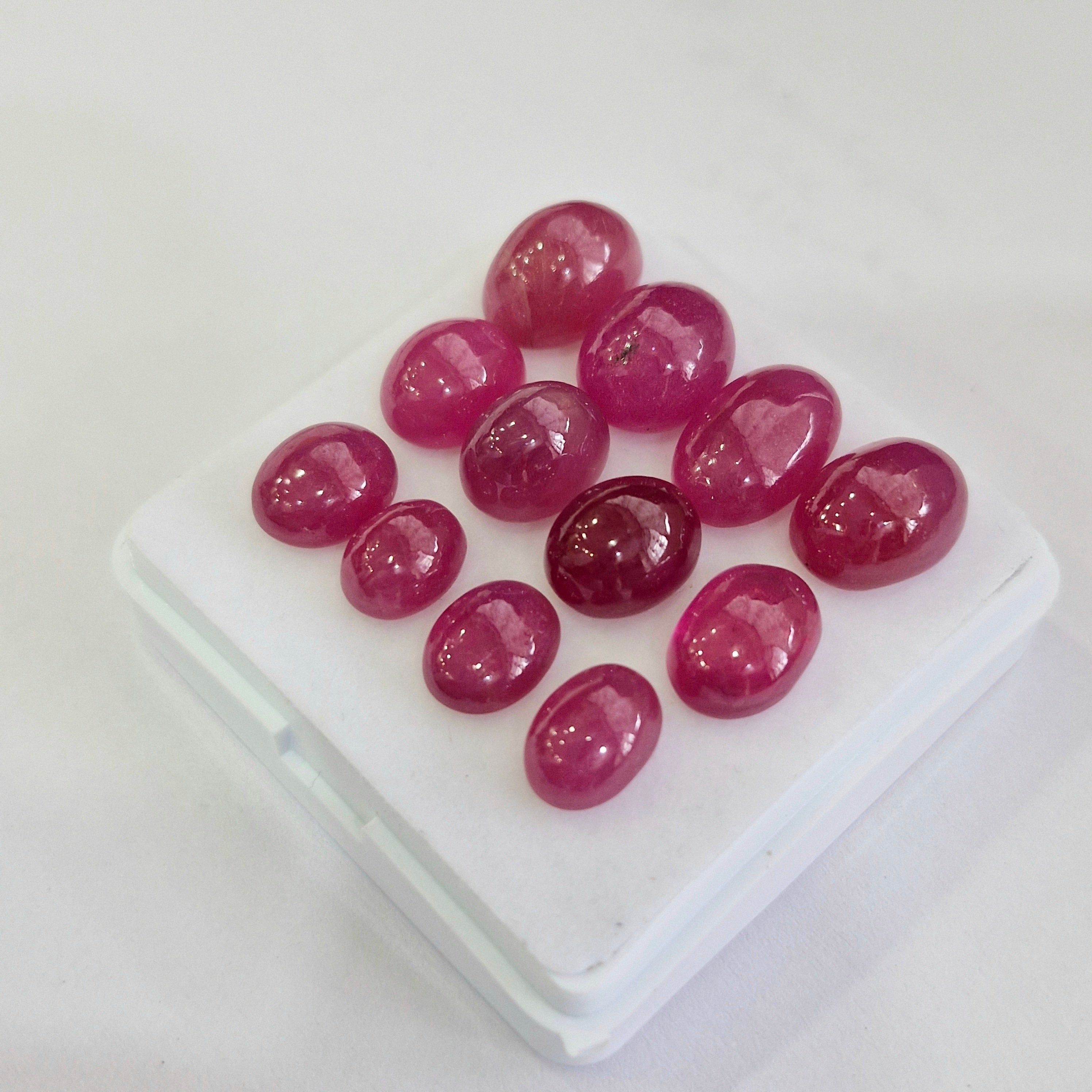 88.1cts Of Natural Clearance Ruby Cabochons | Oval | Size: 9-14mm | 12pcs