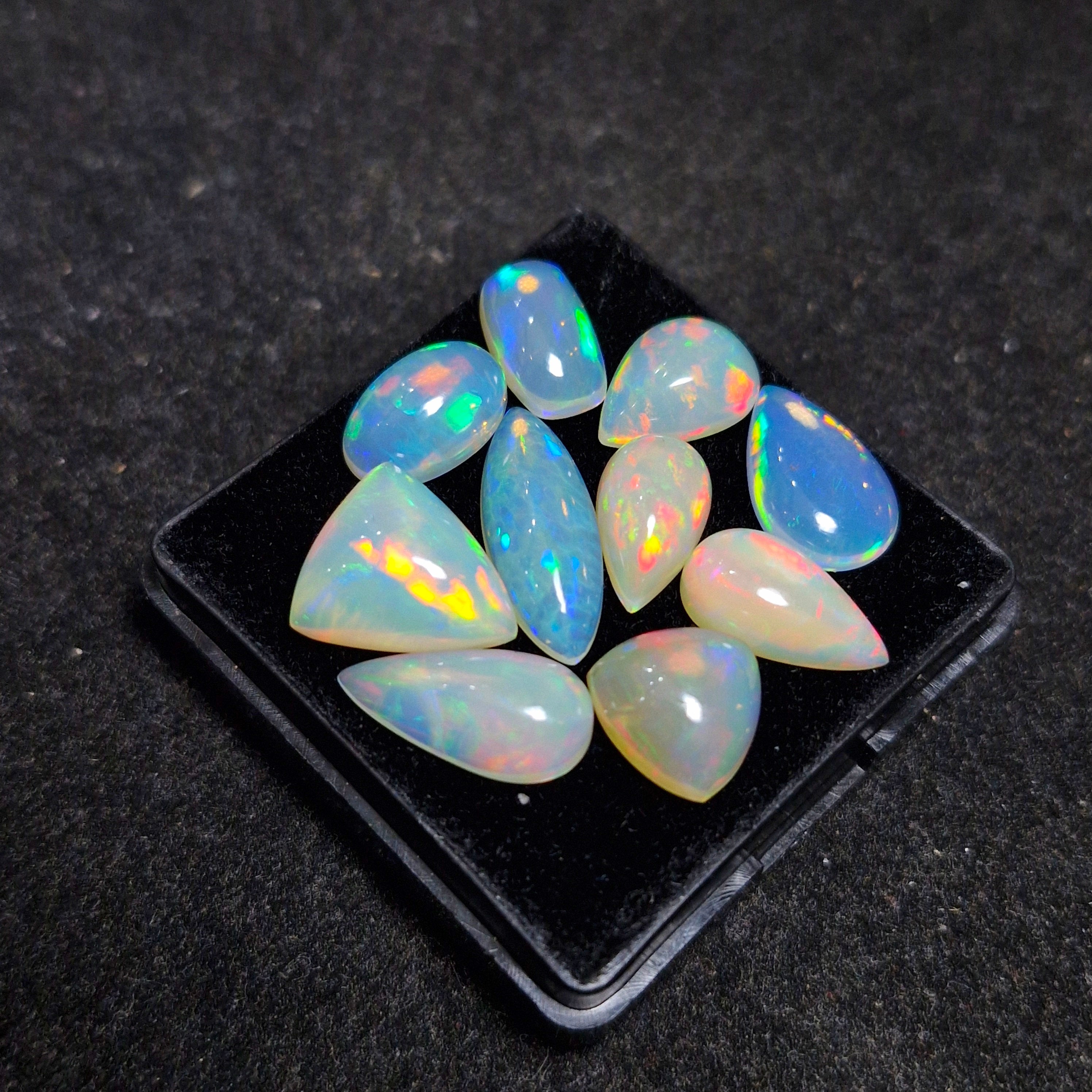 23.4cts Of  Natural Ethiopian Opal Cabochon  | Mix | Size: 10-18mm | 10pcs