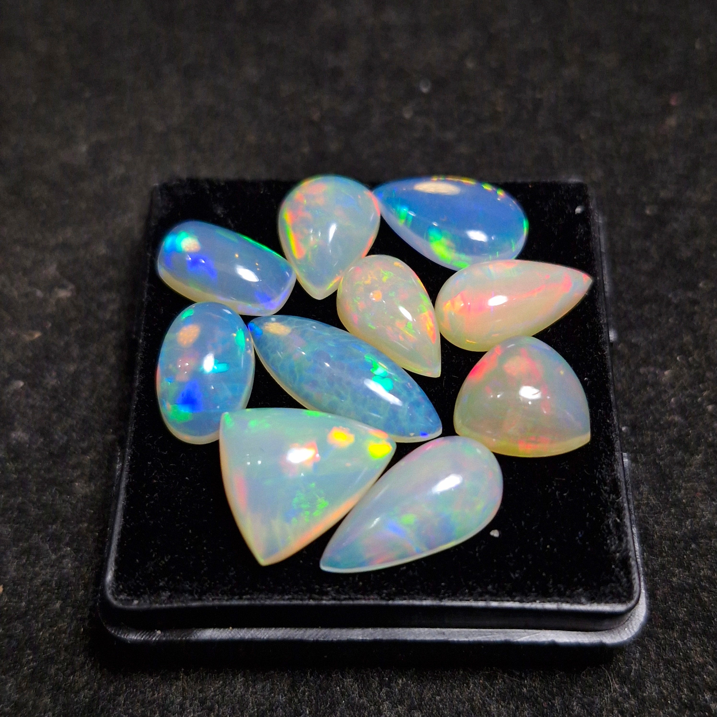 23.4cts Of  Natural Ethiopian Opal Cabochon  | Mix | Size: 10-18mm | 10pcs