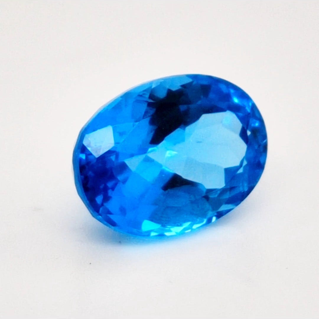 Natural Swiss Blue Topaz Faceted | Oval | 14x10mm - The LabradoriteKing