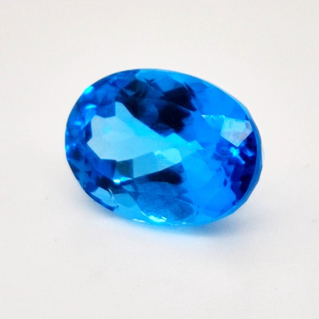 Natural Swiss Blue Topaz Faceted | Oval | 14x10mm - The LabradoriteKing
