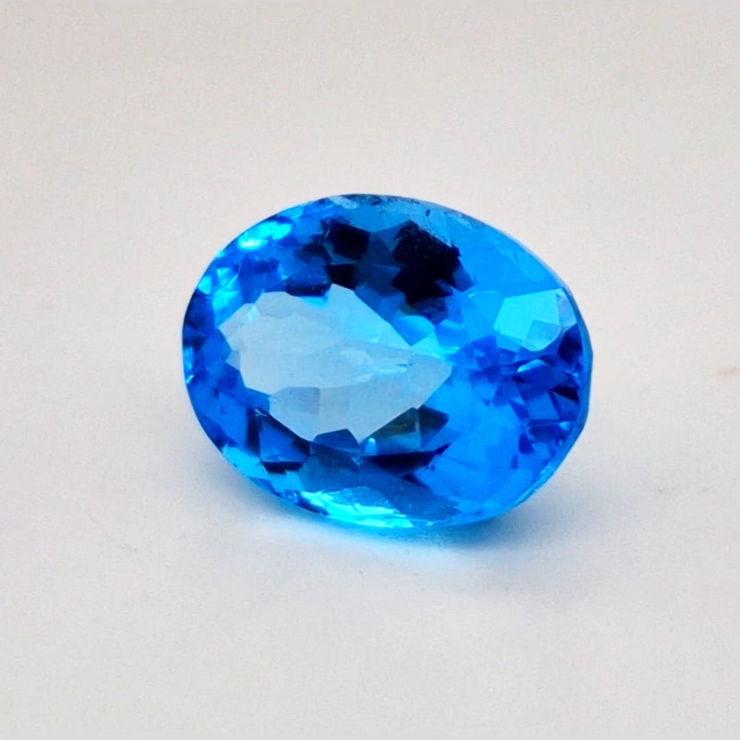 Natural Swiss Blue Topaz Faceted | Oval | 15x11mm - The LabradoriteKing