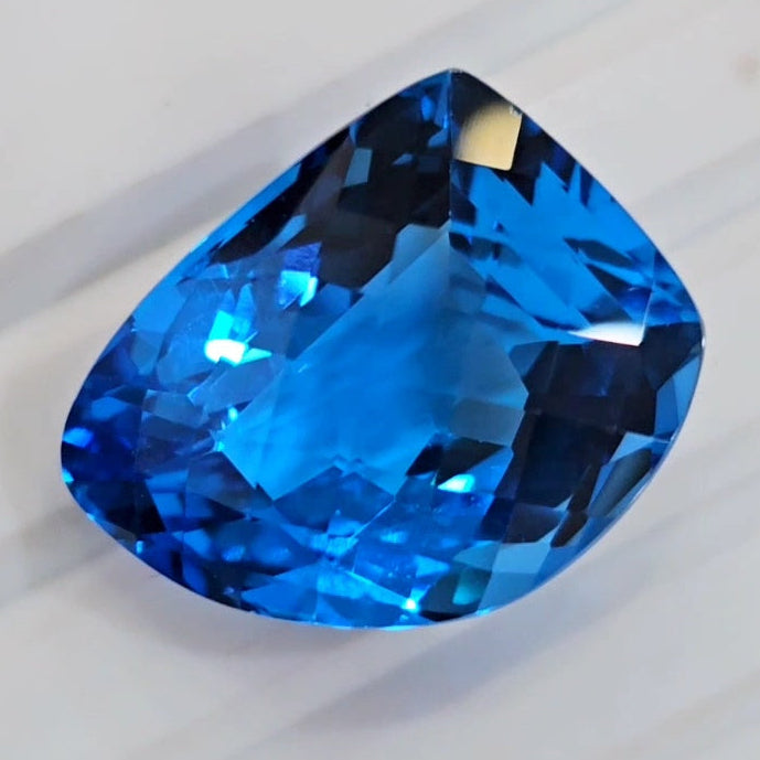 34.8Cts Of Natural Swiss Blue Topaz Checker Cut | Fancy | 22x17mm - The LabradoriteKing
