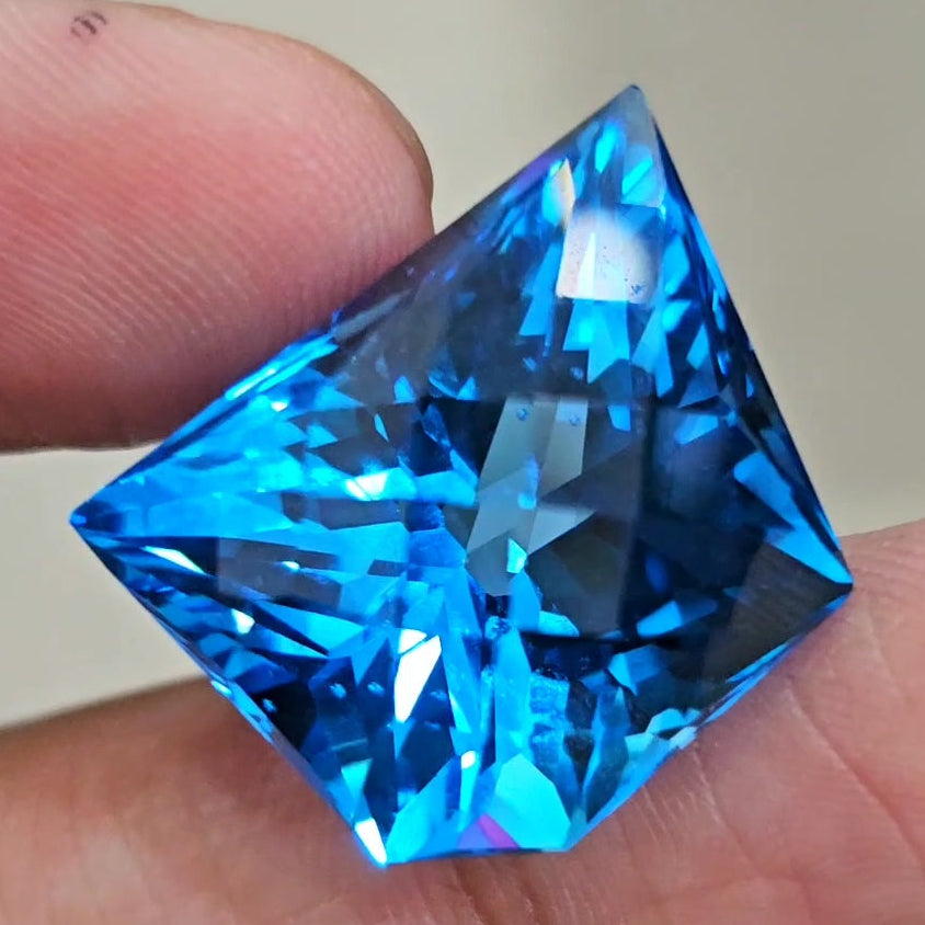 48.2Cts Of Natural Swiss Blue Topaz Checker Cut | Fancy | 23x18mm - The LabradoriteKing
