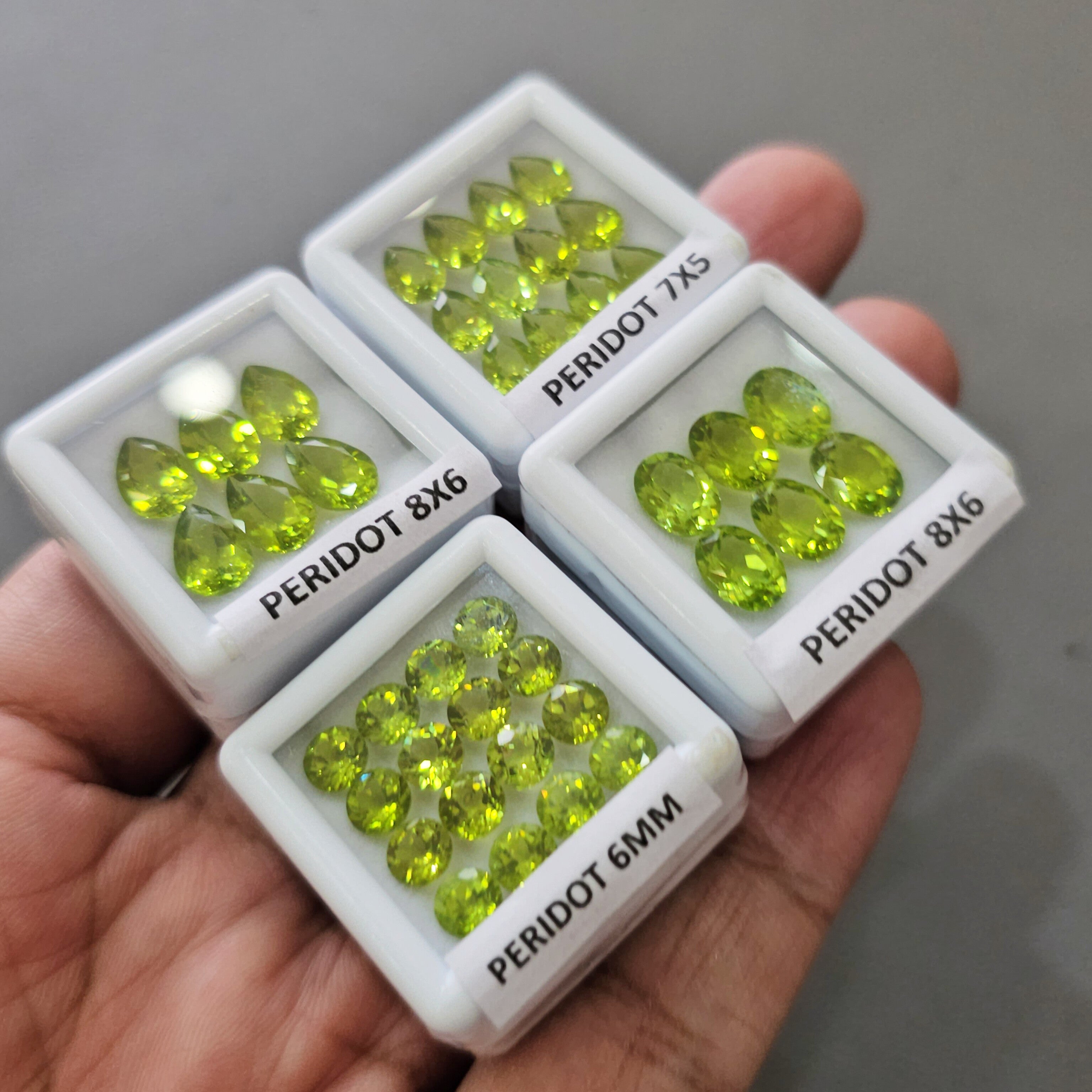 4 Boxes of Natural Peridot Faceted Gemstones | 6–8mm