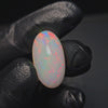 Load and play video in Gallery viewer, 1 Pcs Of Natural Ethopian Opal Oval Shape  |WT: 12.9 Cts|Size: 24x13mm