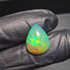 Load and play video in Gallery viewer, 1 Pcs Of Natural Ethopian Opal Pear Shape  |WT: 4.4 Cts|Size: 15x12mm