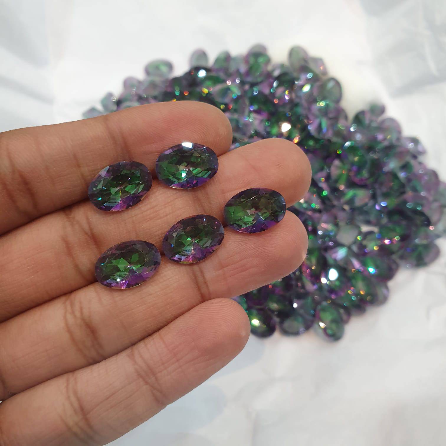 10 Pcs Mystic Topaz Oval 14x10mm Faceted Top Quality - The LabradoriteKing