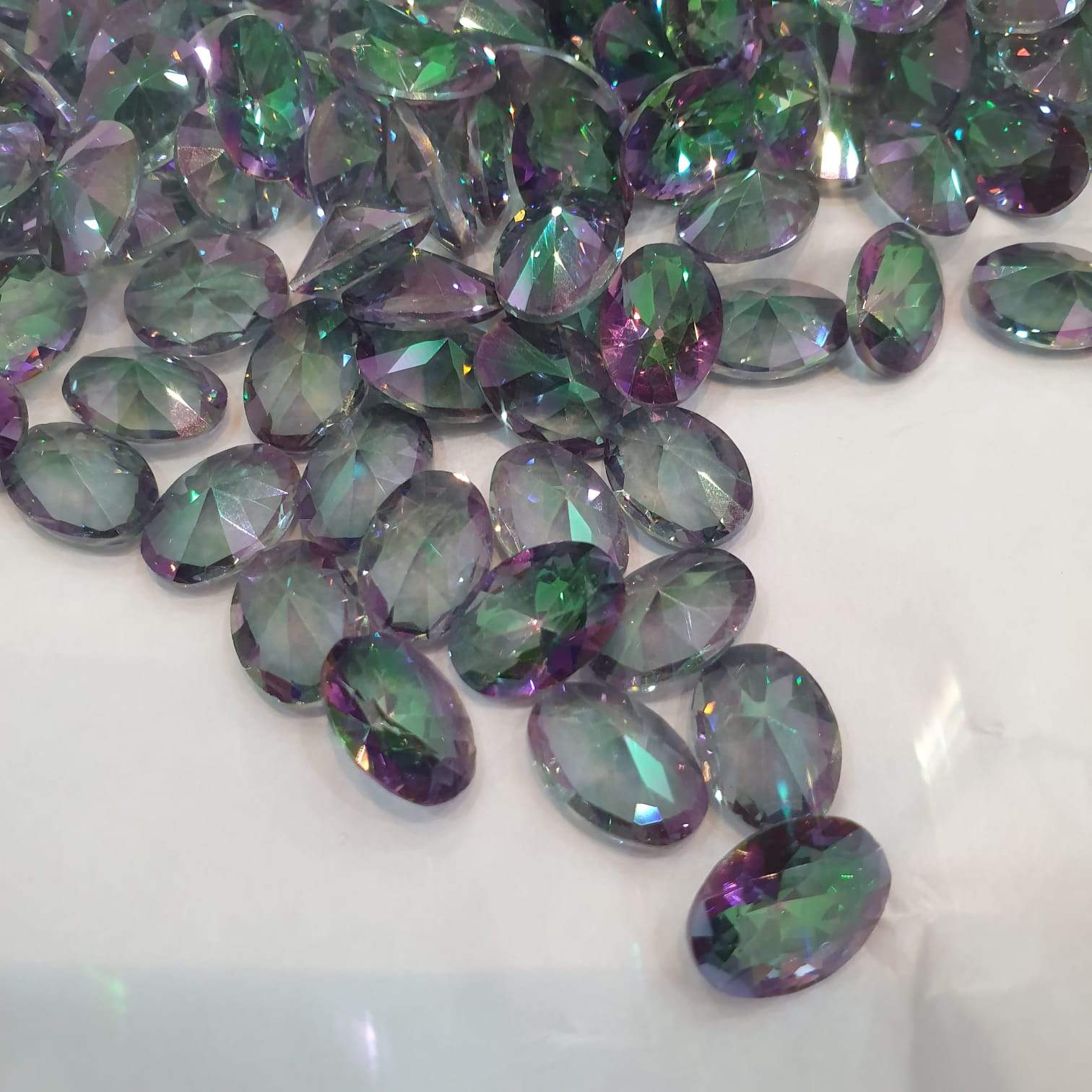 10 Pcs Mystic Topaz Oval 14x10mm Faceted Top Quality - The LabradoriteKing