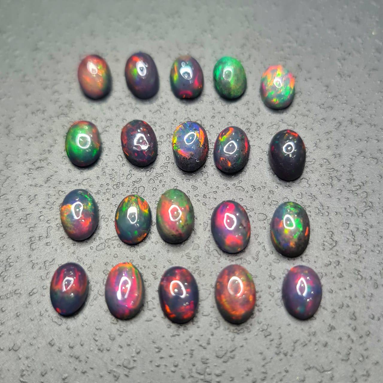 12 Pcs of 6x4mm Smoked Black Opal Cabochons Ovals Calibrated - The LabradoriteKing