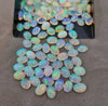 15 Pcs Ethiopian Opal Lot 7x5mm Ovals |  High Quality - The LabradoriteKing