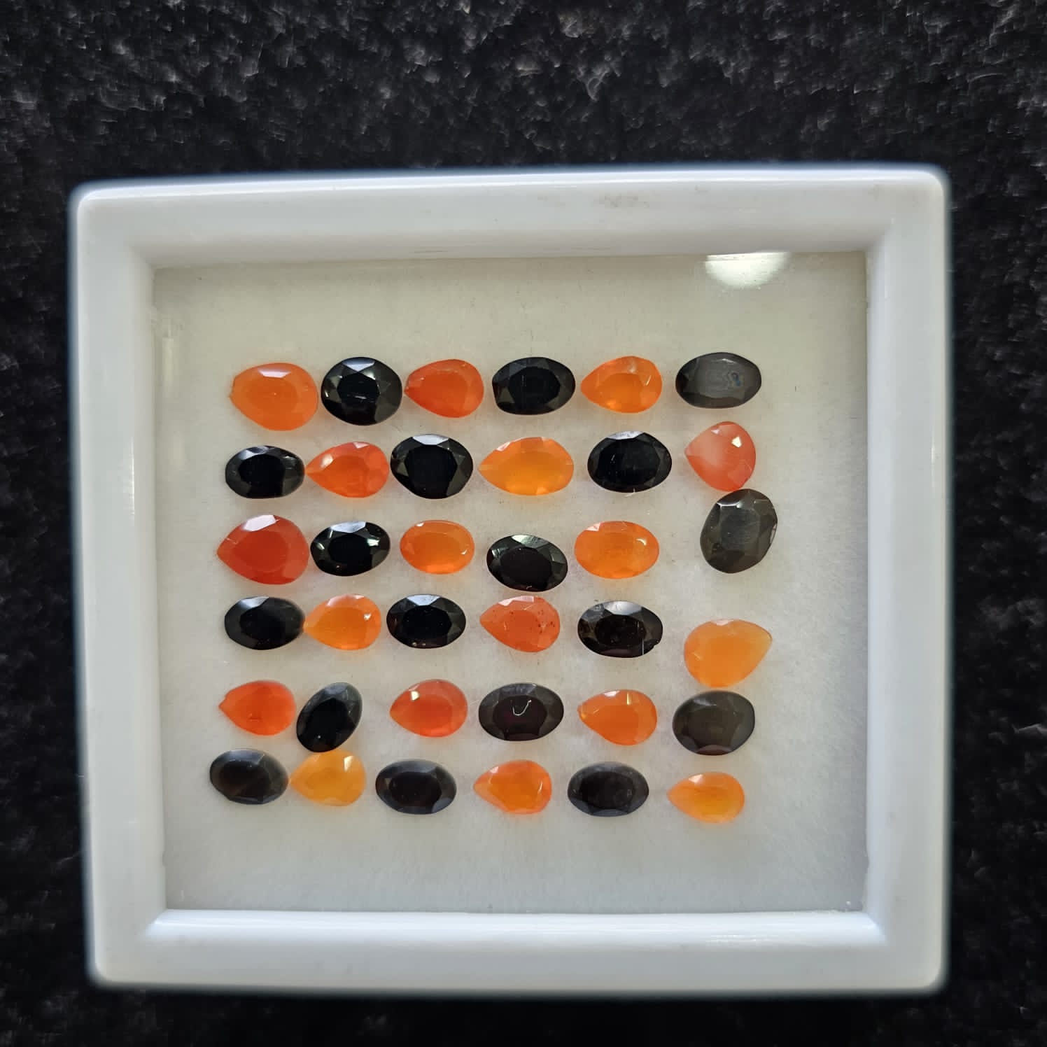 36pcs Natural Black & Orange Onyx Faceted Ovals and Pears Gemstone 6x4mm - The LabradoriteKing