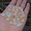 Load and play video in Gallery viewer, Natural Ethiopian Opal Big size Cabochons | 9-12mm |