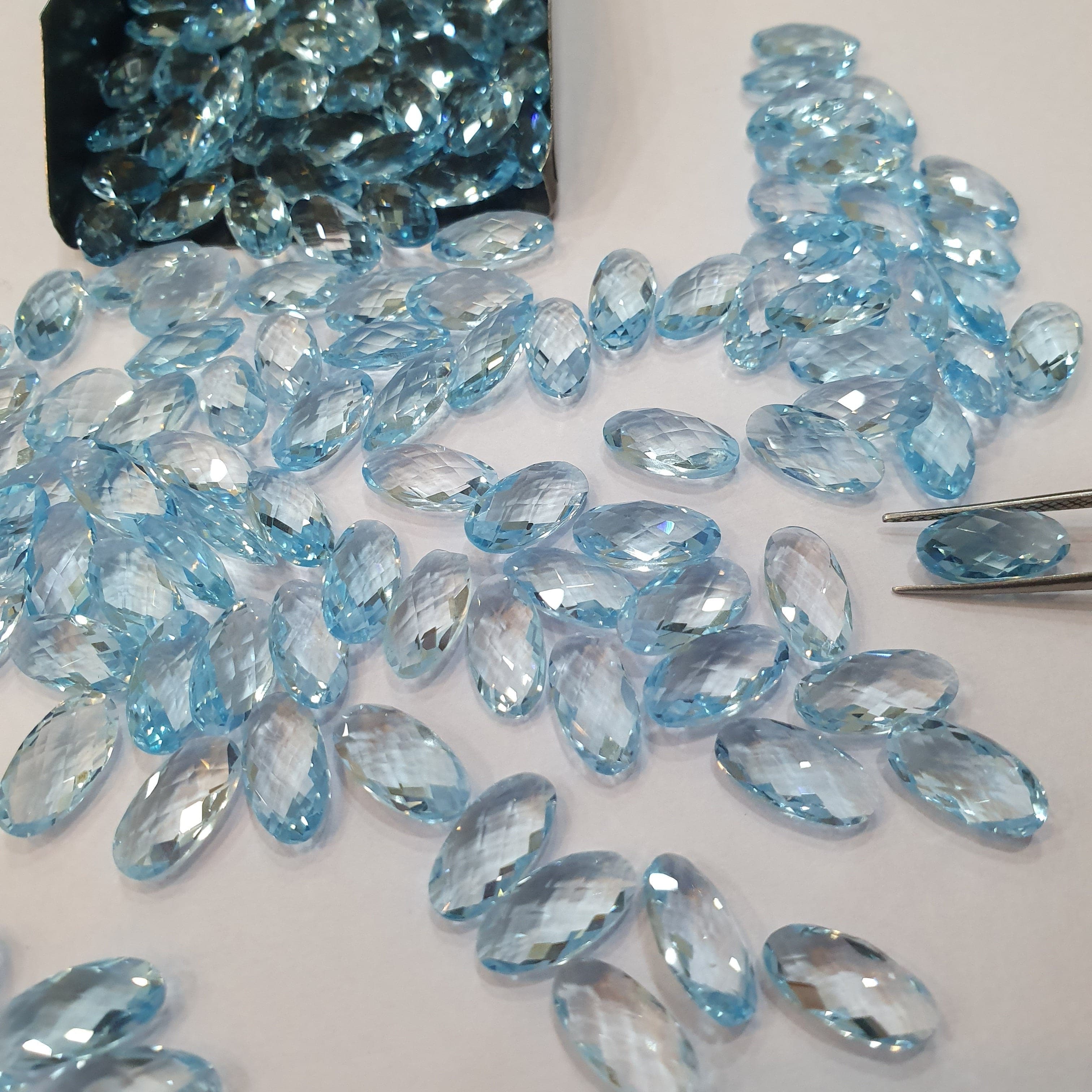 Natural Blue Topaz Long Oval Faceted Checker 12x6mm - The LabradoriteKing