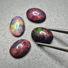 Load image into Gallery viewer, Smoked Black Opal Cabochons 14x10mm cabochons - The LabradoriteKing